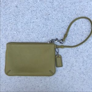 Coach | green wristlet with zipper and strap